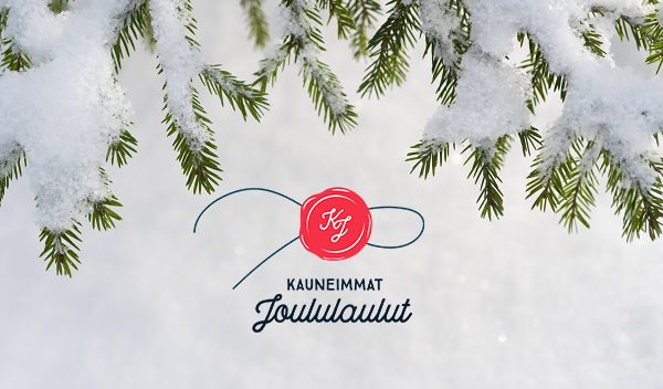 Koko Suomen Kauneimmat Joululaulut Kauneimmat Joululaulut sinetti logo, taustalla lumiset havut